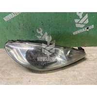 Стекло фары правой Peugeot 206 98-12
