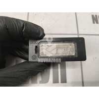 Фонарь подсветки номера Skoda Yeti 2009-2018