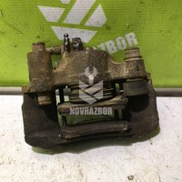 Суппорт передний левый Kia RIO 1 2000-2004